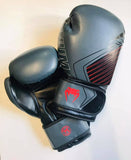 Grey/Red Venum Contender boxing gloves with Velcro wrist fastening.